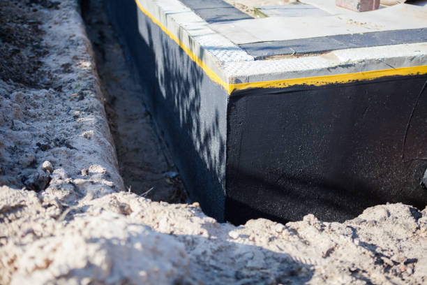Professional Waterproofing technician working in Port Monmouth, NJ